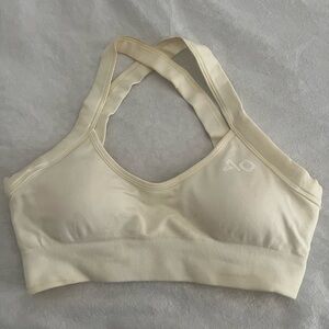 Seamless Cream Sports Bra with Cross-Back Straps